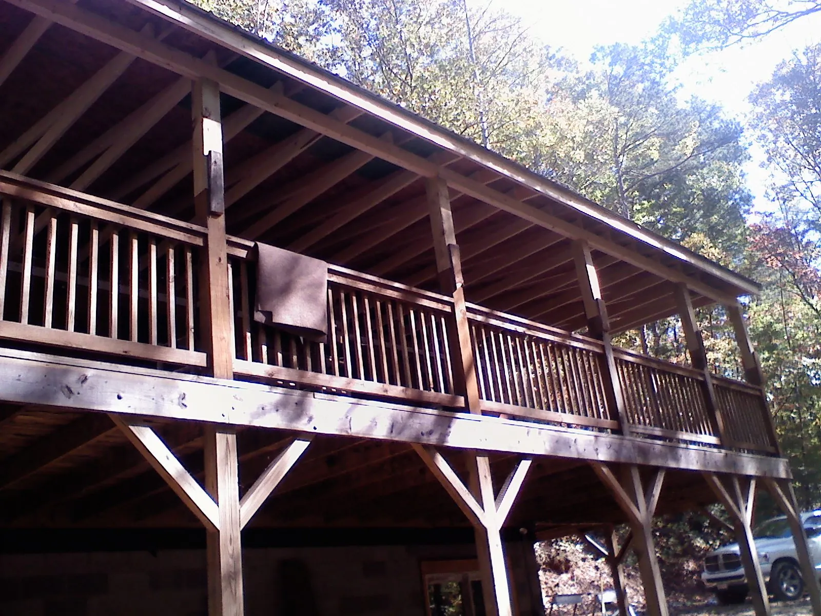 Timber framing under a new elevated porch and deck — Roof Leak Repair in Harpersville by Roofing Brothers